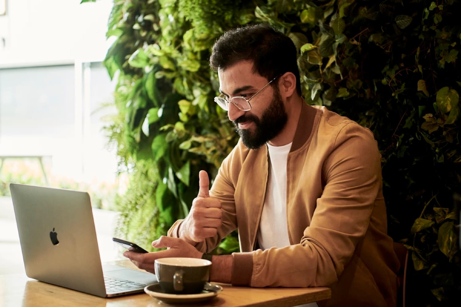 Amazon professional using AI tools productively on a laptop